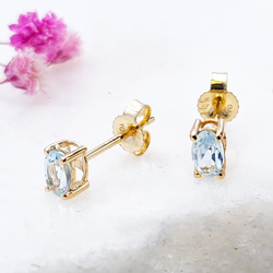 Kolczyki złoto próby 585, wkrętki z topazem niebieskim
