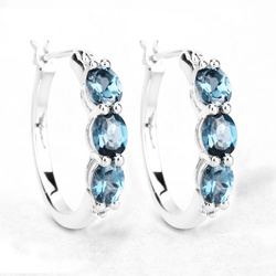 Srebrne wiszące kolczyki z topazem London blue i z diamentami