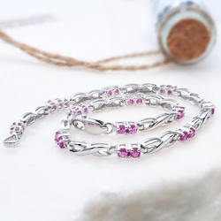 Damska bransoletka kulki rubinowe osadzone w srebrze 925